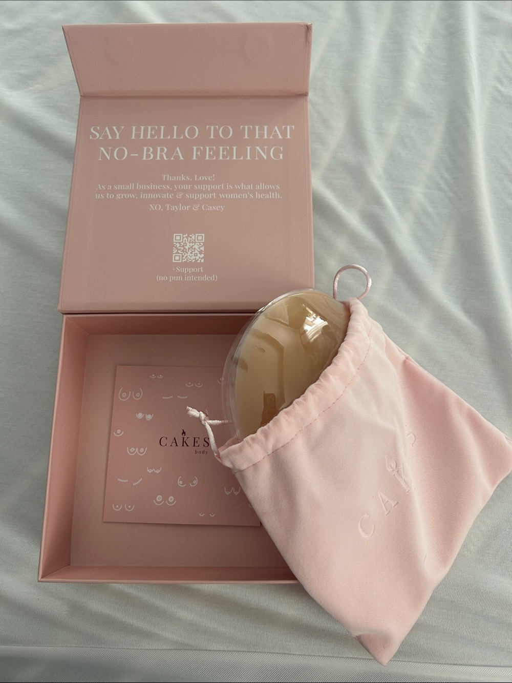 New , never been used CAKES Nude Silicone Bra Inserts with Pink Drawstring Pouch